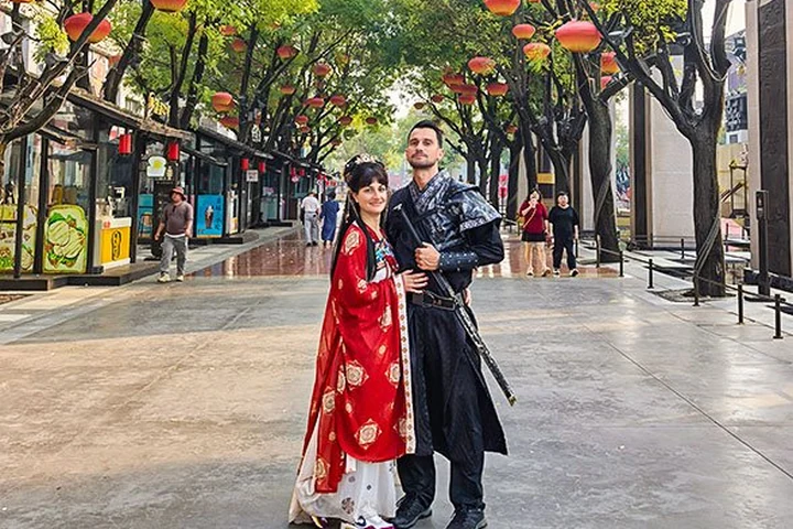 Travelers trying traditional Han clothing in Xian