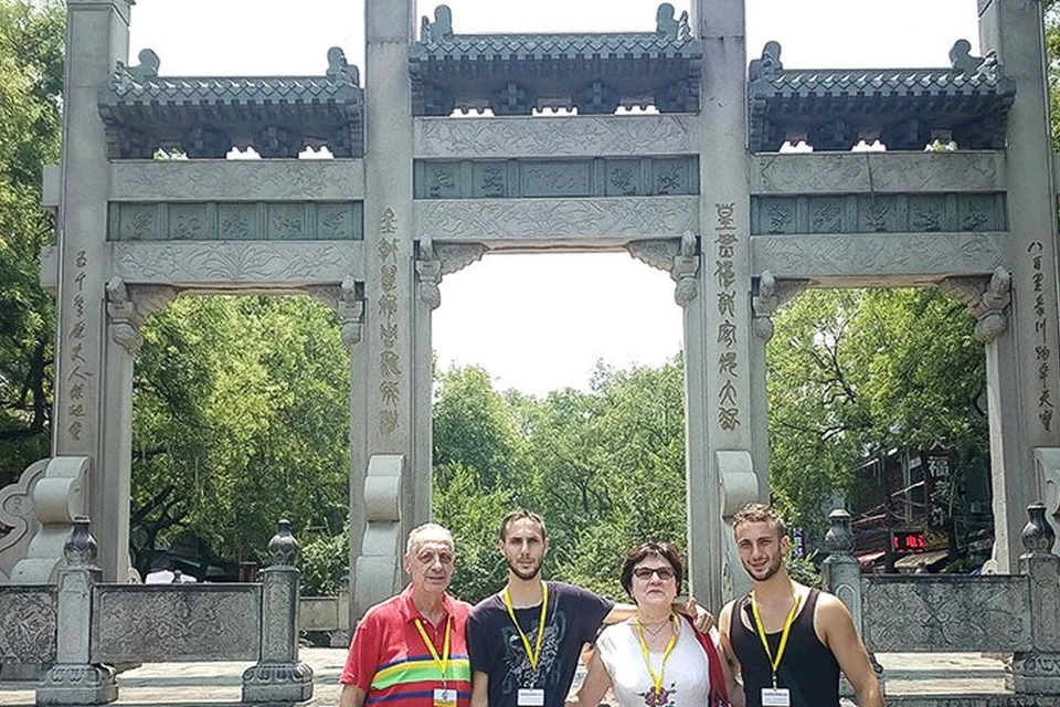 Travelers visiting the Great Mosque area of Xian Muslim Quarter