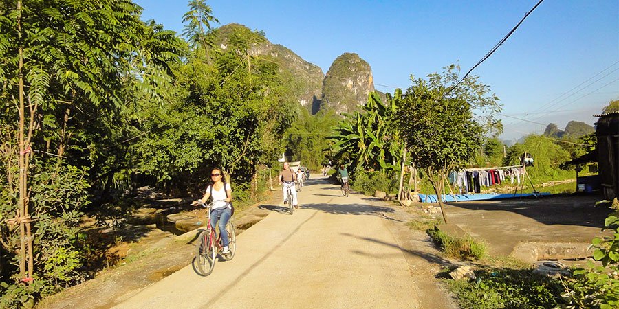 Tourists Cycling in September with Favorable Weather
