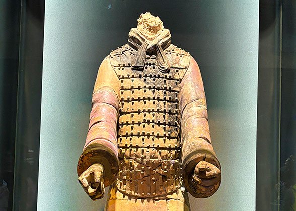 Terracotta Figure with Purple Sleeves