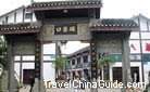 The gate built in the old chinese style and engraved with golden letters is the entrance to the porcelain village.