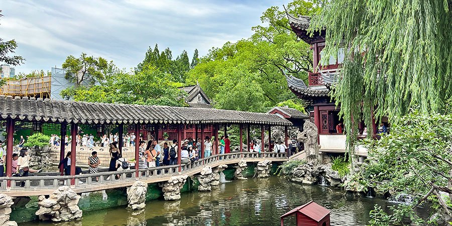 People Visiting the Yu Garden in Hot August