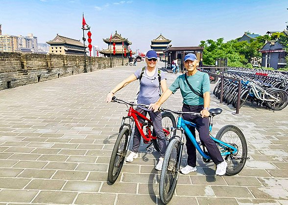 Our Clients Cycling on the City Wall Our Clients Cycling on the City Wall
