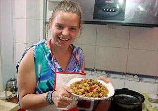 Ms. Skye Rachel Miller with the Kung Pao Chicken Cooked by Herself