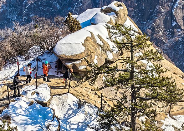 Tourists Hiking on "Hawk Turning Over"