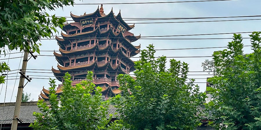 Yellow Crane Tower on Overcast Day