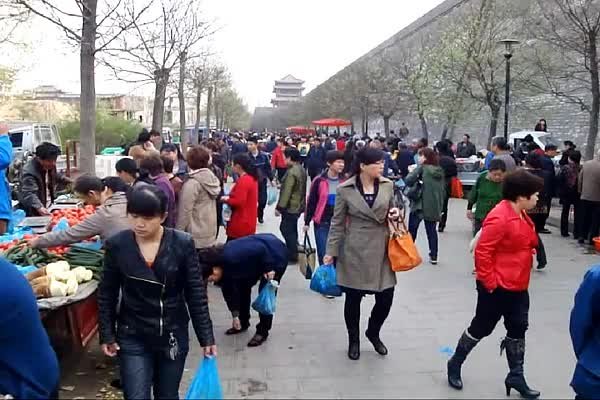 A Vegetable Market at the Foot of Xian City Wall
