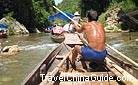 A strong tracker try his best to row the boat