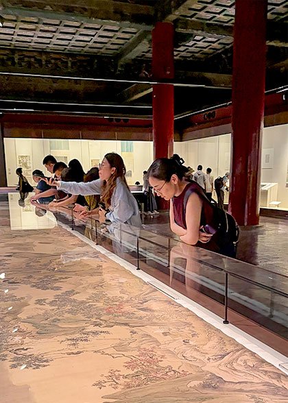 Admiring the Exhibit in the Main Hall