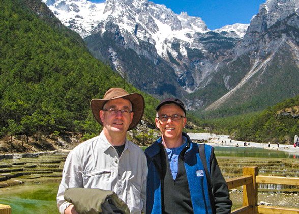 Visitors before Jade Dragon Snow Mountain