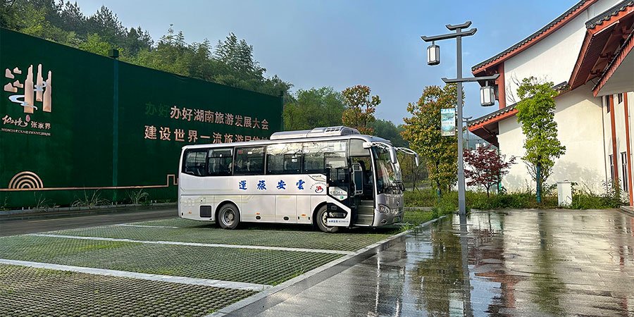 Tourist Bus Waiting at Zhangjiajie Grand Canyon