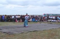 A Mongolian Girl Singing A Solo 