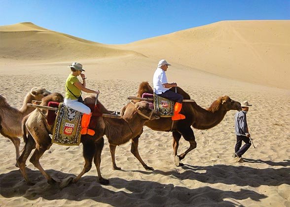 Ride Camel at Echoing Sand Dune, Dunhuang Ride Camel at Echoing Sand Dune, Dunhuang