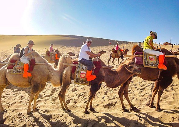 Camel-riding along the Echoing-Sand Dune