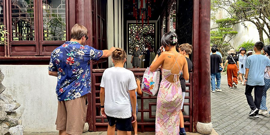 Visitors in the Yu Garden in Hot July