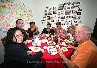Our Guests Enjoying Meal in a Local Familly