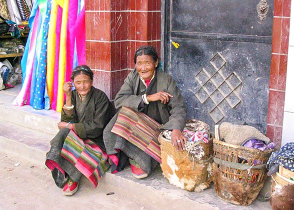 Tibetan people on the old street in Gyangtse