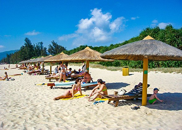 Sunbathers on the White Sandy Beach