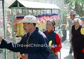 Walk Clockwise around the Prayer Wheels