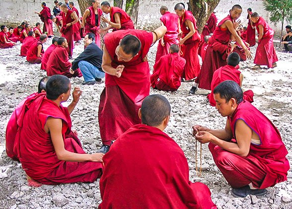 Monks Debaitng in Sera Temple, Lhasa Monks Debaitng in Sera Temple, Lhasa